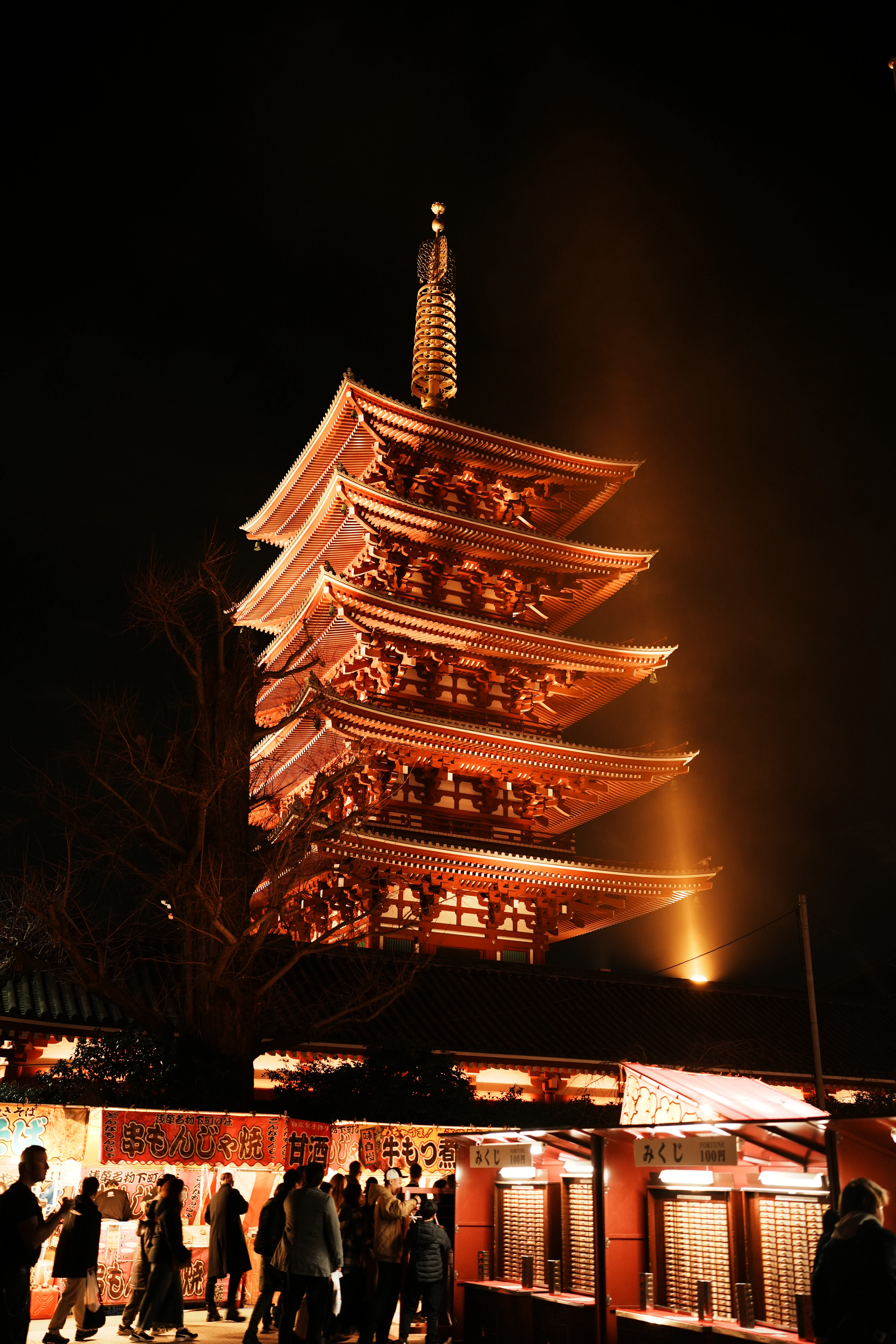 A pagoda glowing after sunset